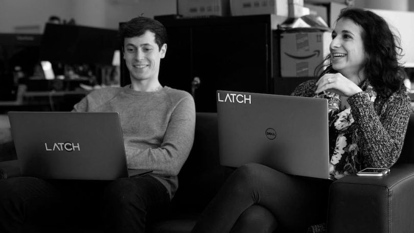 Latch's team members laughing together