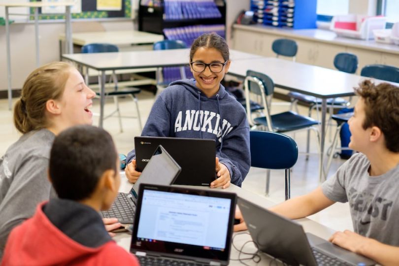 Leap Innovations —&nbsp;children laughing in a classroom