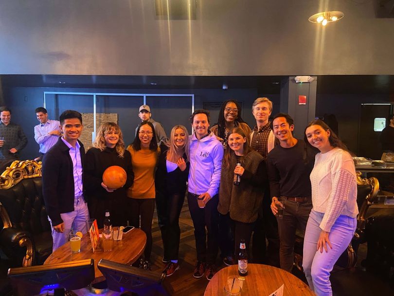 Lev Capital team members at a restaurant together
