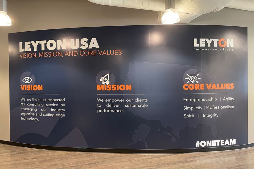 Sign in the Leyton office with mission, vision and core values