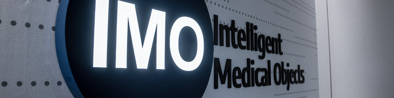 Intelligent Medical Objects logo on a wall