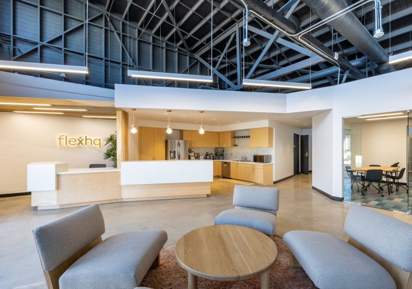 The interior lobby of FlexHQ's coworking space.