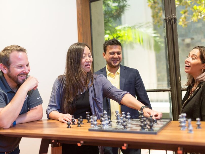 The ClubLabs team playing chess in the office
