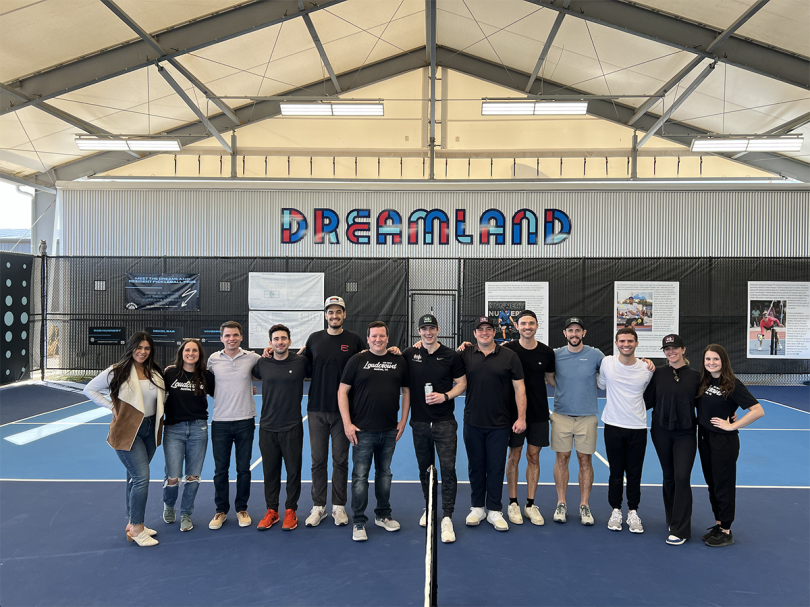 LoudCrowd team photo on a pickleball court