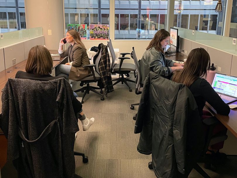 Marketing Store team members working in the office