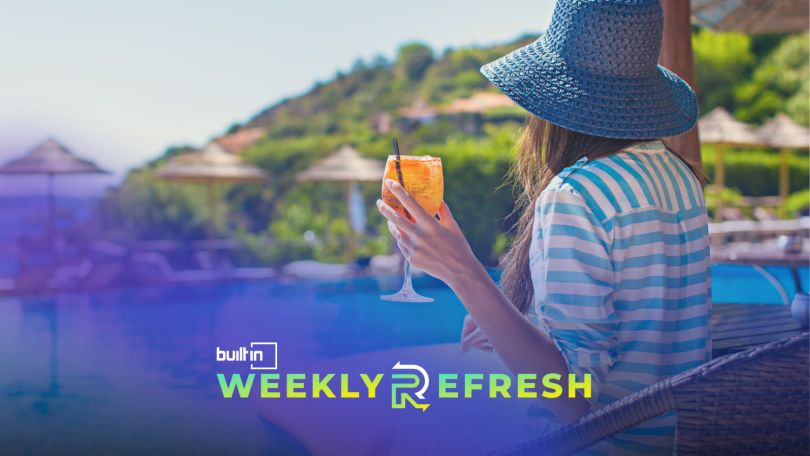 Woman holding a drink by the pool