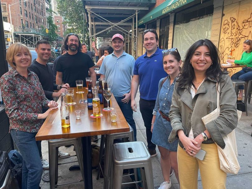 Nayya coworkers at happy hour at a craft brewery