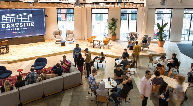 The Favor team gathered in a communal office space.