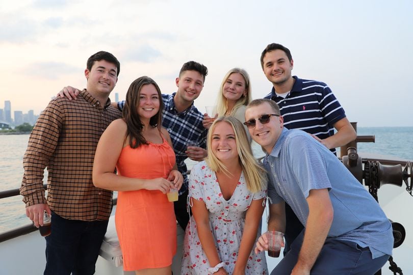 PHMG team members on a boat