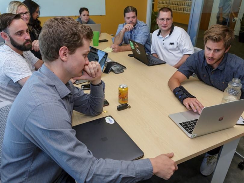 Pax8 staff at a conference table