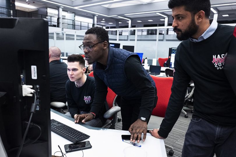 Peak6 team members working in the office