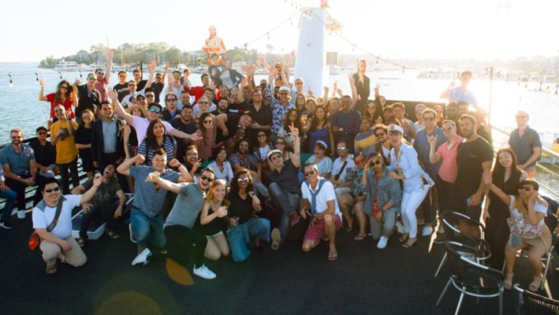 Pluto TV team members on a boat