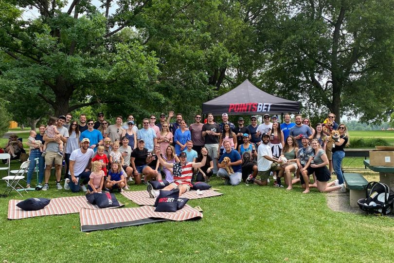 PointsBet team members hanging out together at a park