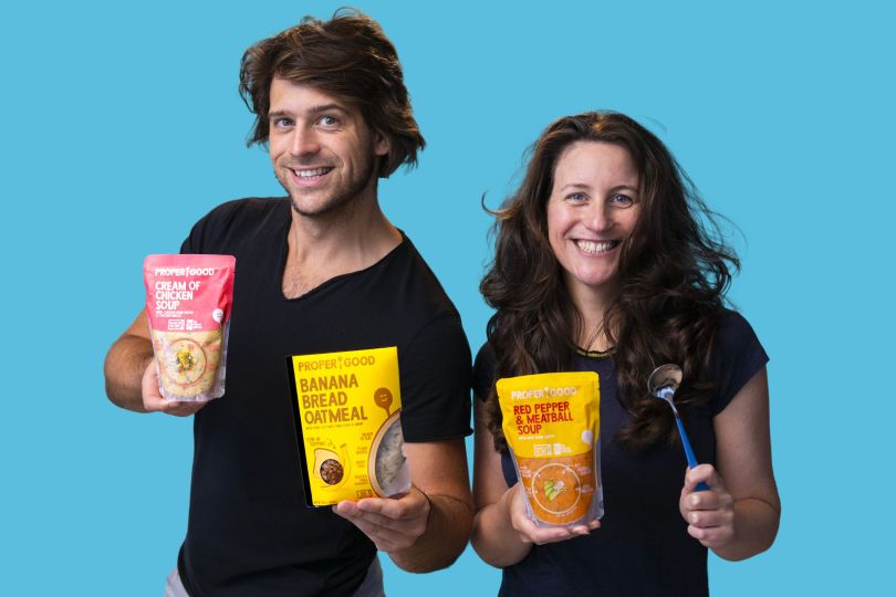 PROPER GOOD co-founders and siblings Christopher and Jennifer Jane hold products