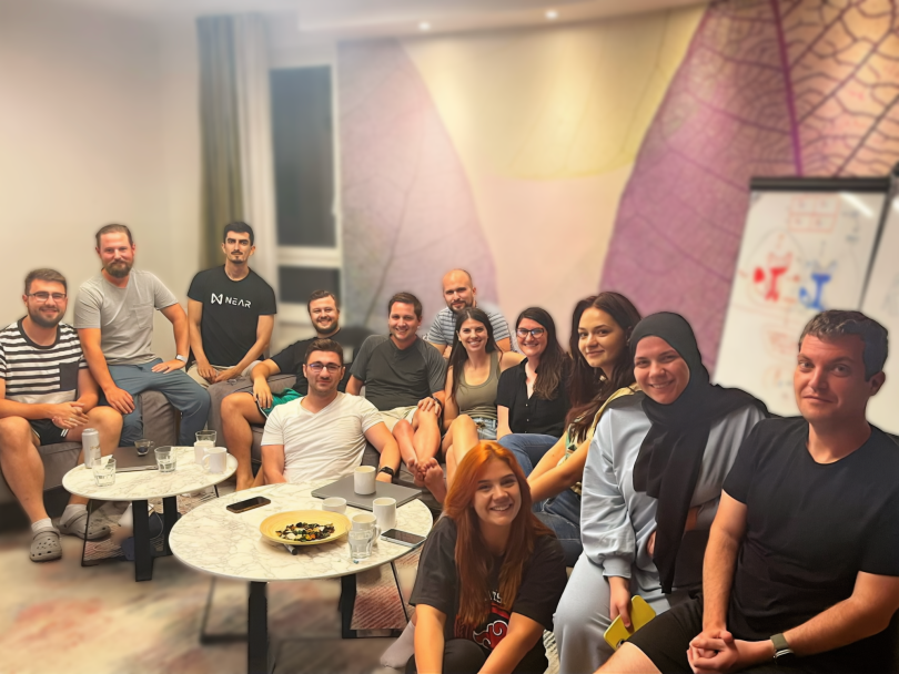 The RSVPify team sits together for a group photo.