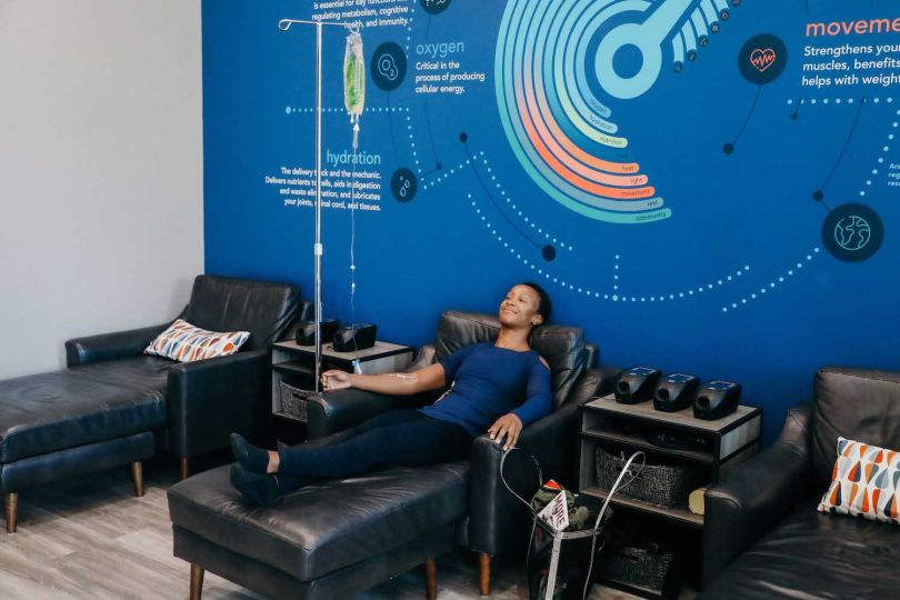 A Restore client receives IV drip therapy