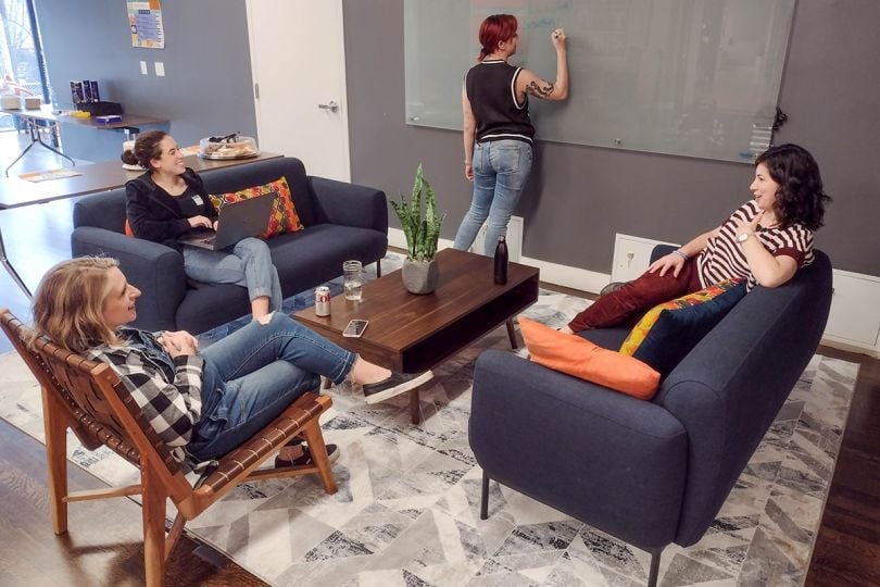 Reverb team members having a brainstorming meeting in the office
