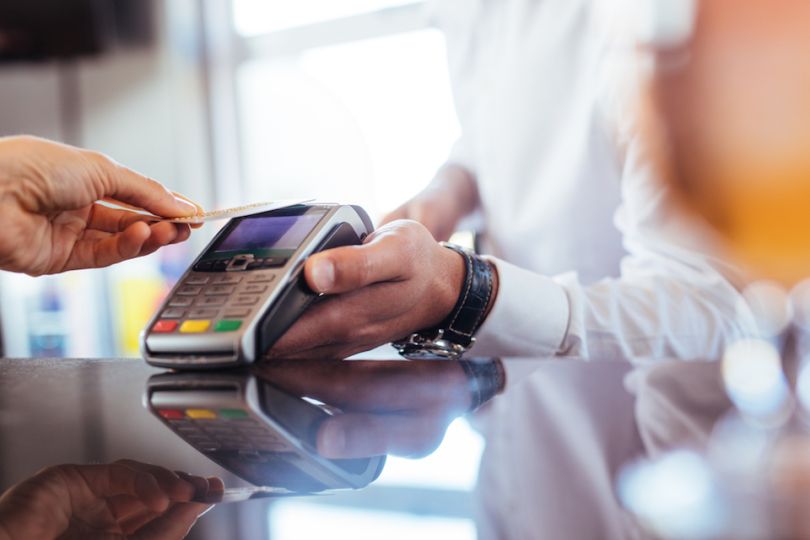 Person using card at counter - Rippleshot