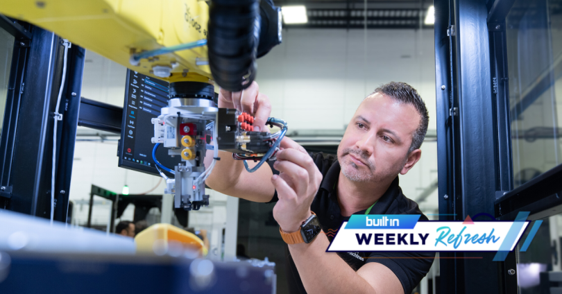 A Bright Machines employee works on a device.