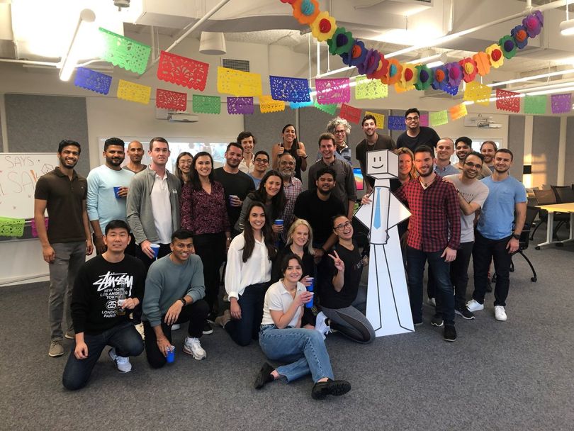 SIMON team member group photo at the office