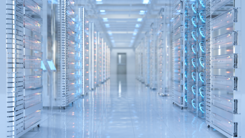 High-tech bright data center with computers and lights.