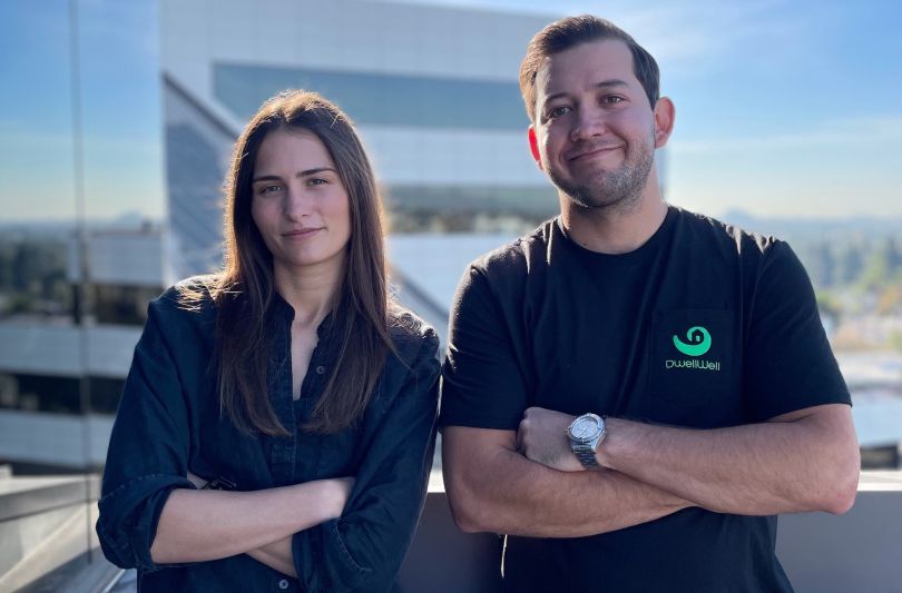 DwellWell co-founders Matt Canzoneri and Sam Carow pose for a photo outside.