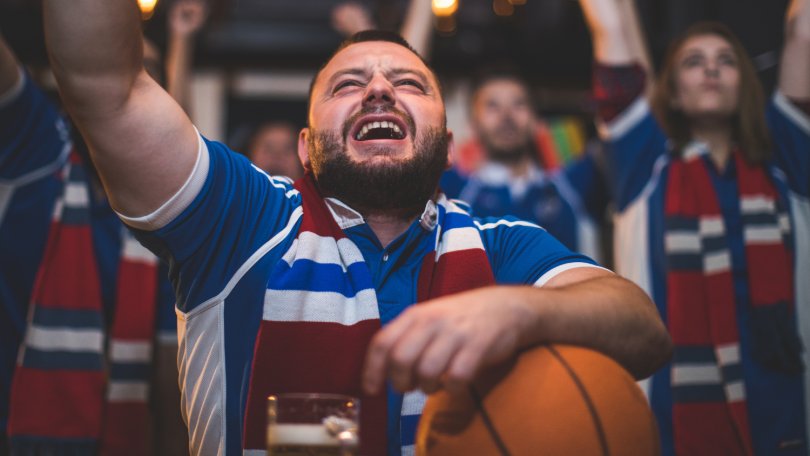 Basketball fan cheering