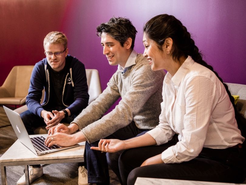 Showpad team members working in a conference room