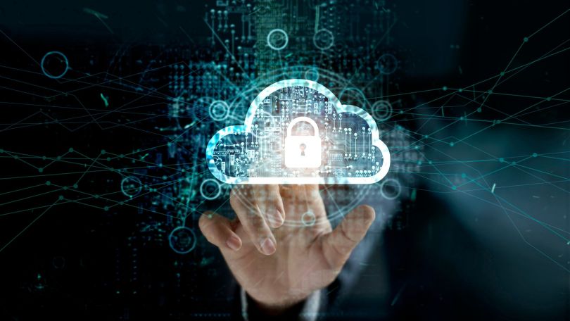 A hand reaching out to touch icons related to cybersecurity. 