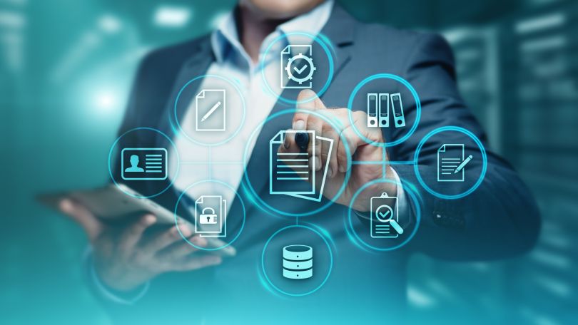A professional working with a document management system. 