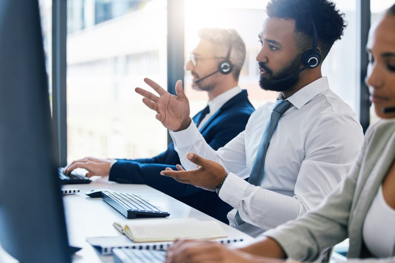 Call center employees on customer calls
