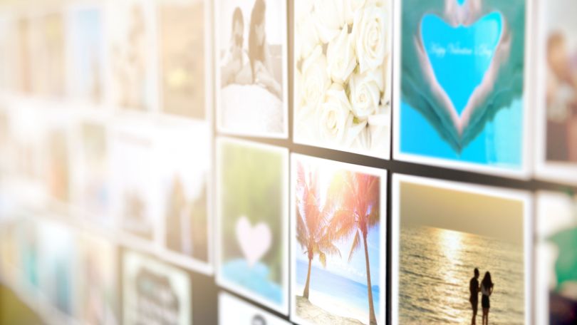 Photos displayed on a wall. 