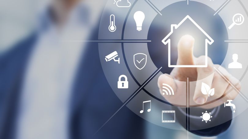 A person uses a smart home app. 