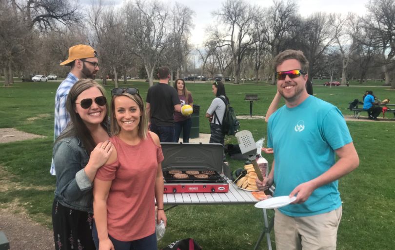 Signpost team members grilling