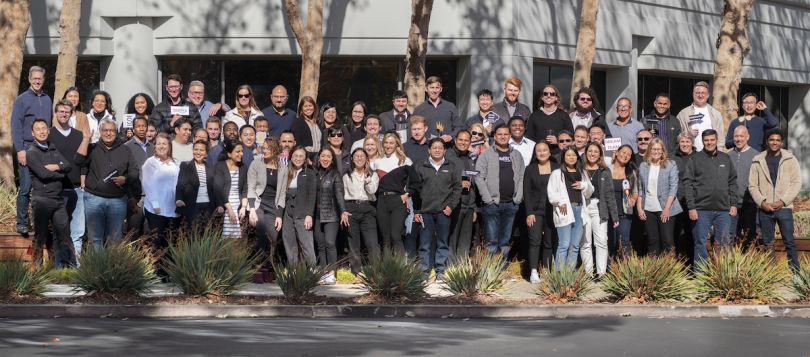 The Simpplr team poses for a group photo outside