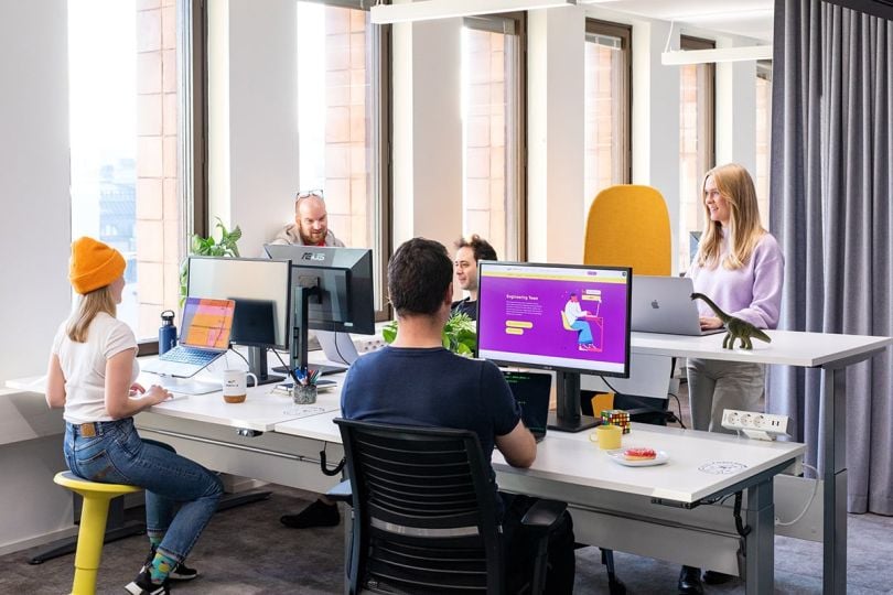 Smartly.io team members working in the office