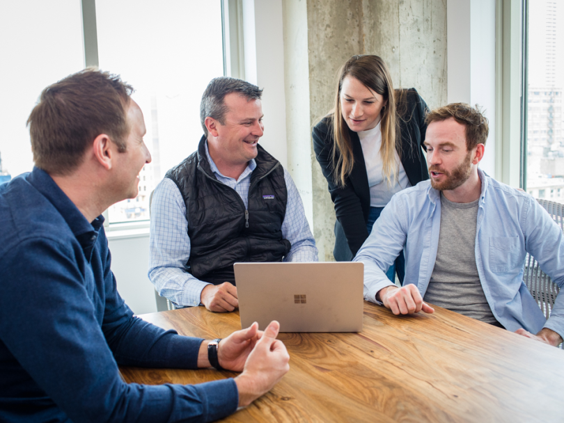 John Steele with team members - Pareto Intelligence
