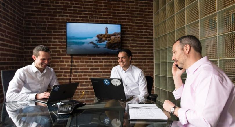 SonderMind's team meets to discuss strategy.