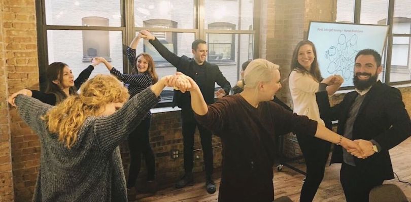 SpotMe team doing a weird dance