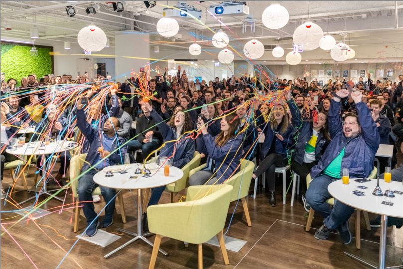 Sprout Social team members throwing streamers