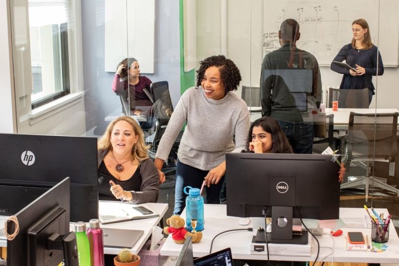 Spruce team members working on a project together