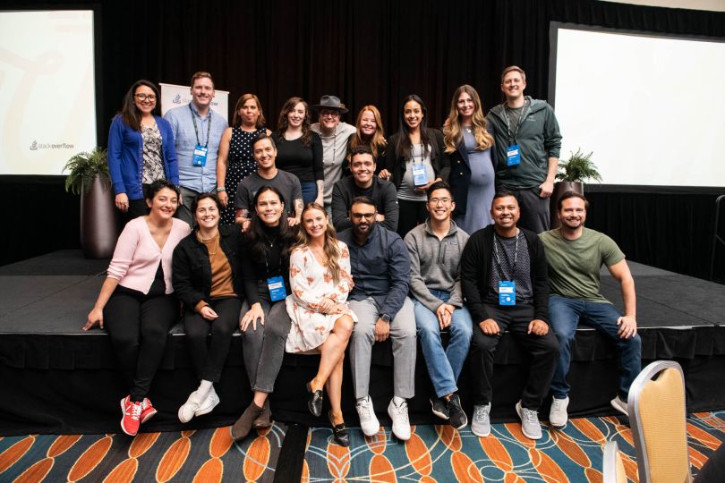 A group of Stack Overflow employees pose together.