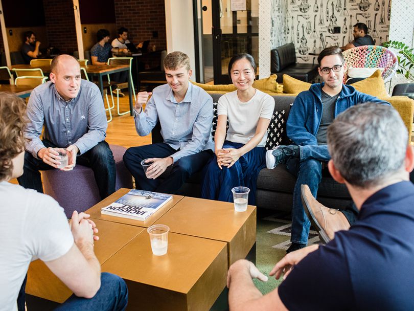 Strong Analytics team chatting 