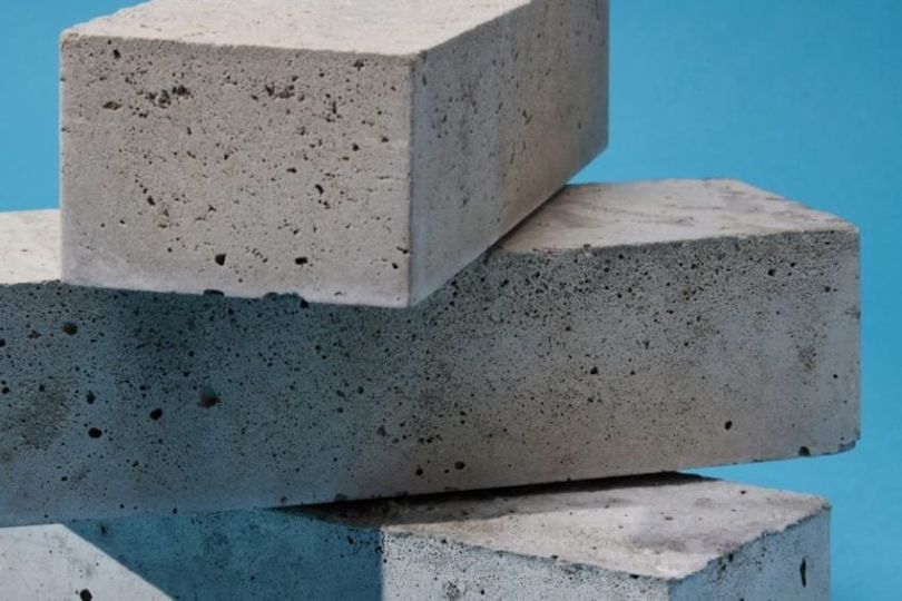 A photo of Sublime Systems' cement product against a blue background