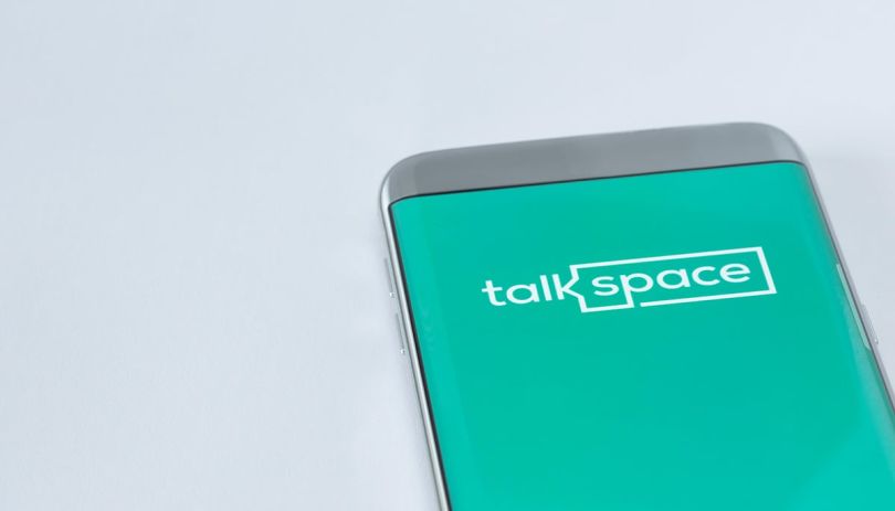 Talkspace logo on a mobile phone