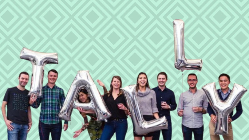 The Tally team holding balloons that spell “Tally”