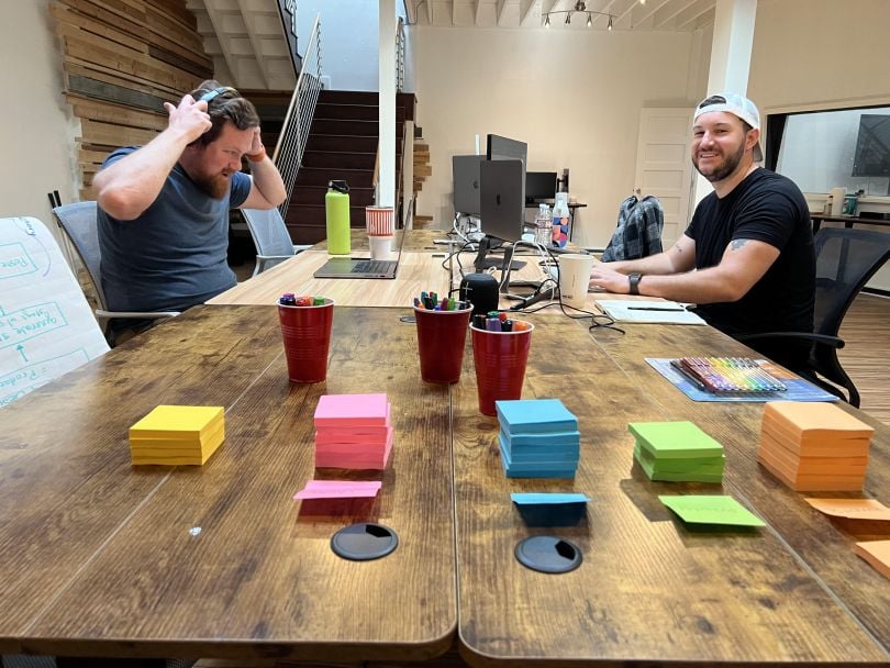 The Gembah team working at a table
