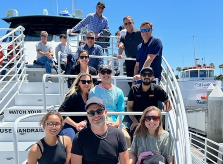 Traffic Tech team members on a boat