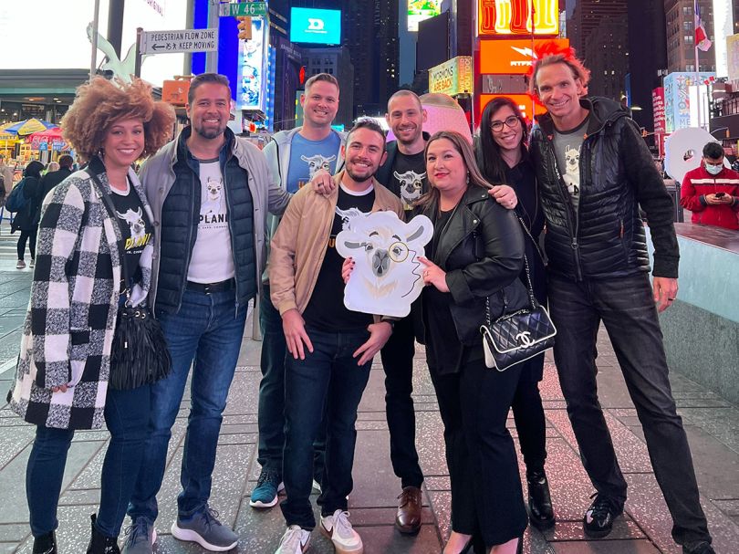 Uplandme team members in Times Square