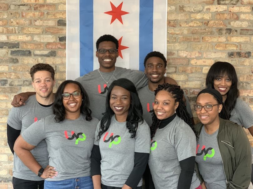 Upwork team members standing together for photo